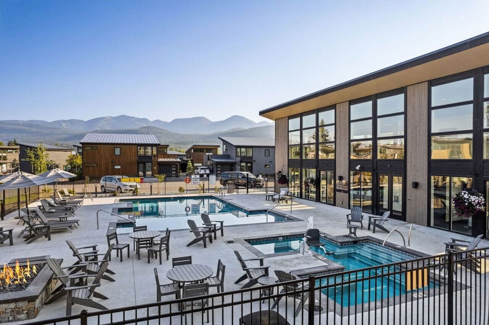 Poolside Paradise: Dive into relaxation with stunning mountain views and inviting lounge areas!