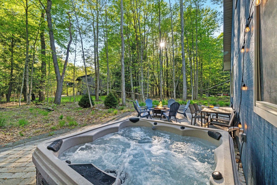 Pull a chair up to the fire and pass the marshmallow sticks around — let the flames do the talking under a canopy of trees.   