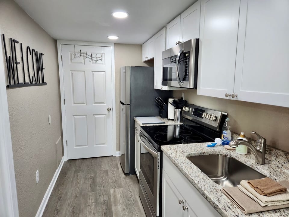 Ice maker, full size microwave, glass top stove, oven, toaster, Keurig, etc...