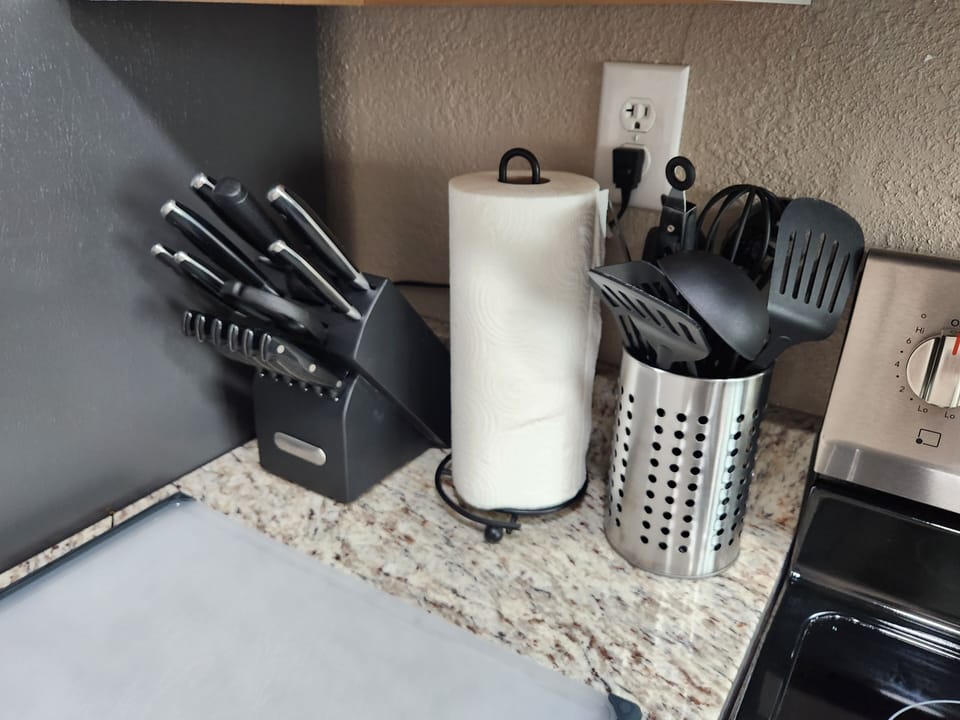 NEW knife block, paper towels, cutting board and utensils...