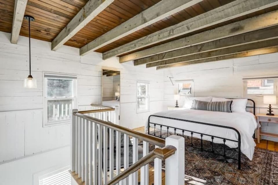 King sized bed, luggage racks and wireless night stand chargers are provided