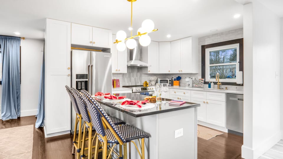 Stylish breakfast bar merges modern elegance and casual dining.