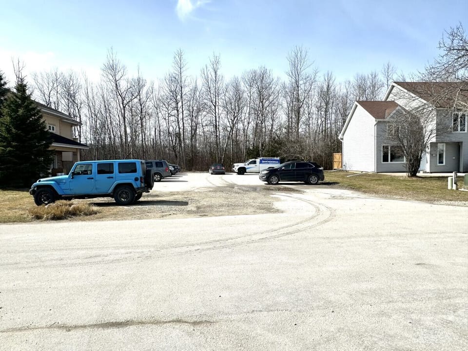 Large Free  Parking lot across from Condo unit please do not park in front of units 172 and 174