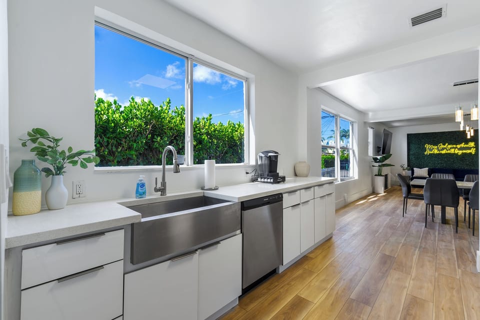 Open-concept kitchen with full appliances and great indoor-outdoor flow.