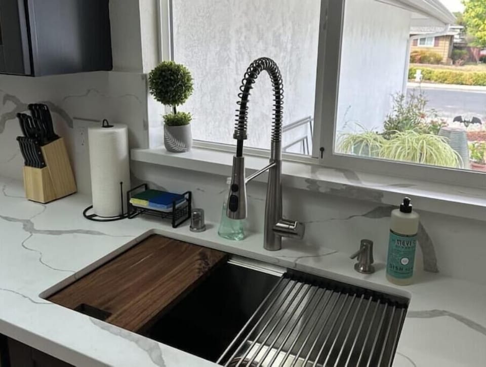 Brand new industrial sink with cutting board and dryer slide-ons