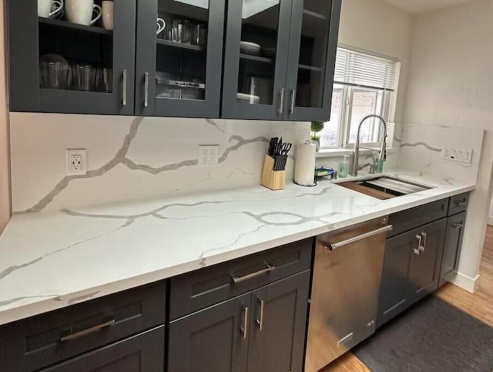 Our kitchen includes stainless steel appliances, toaster, kettle, & keurig