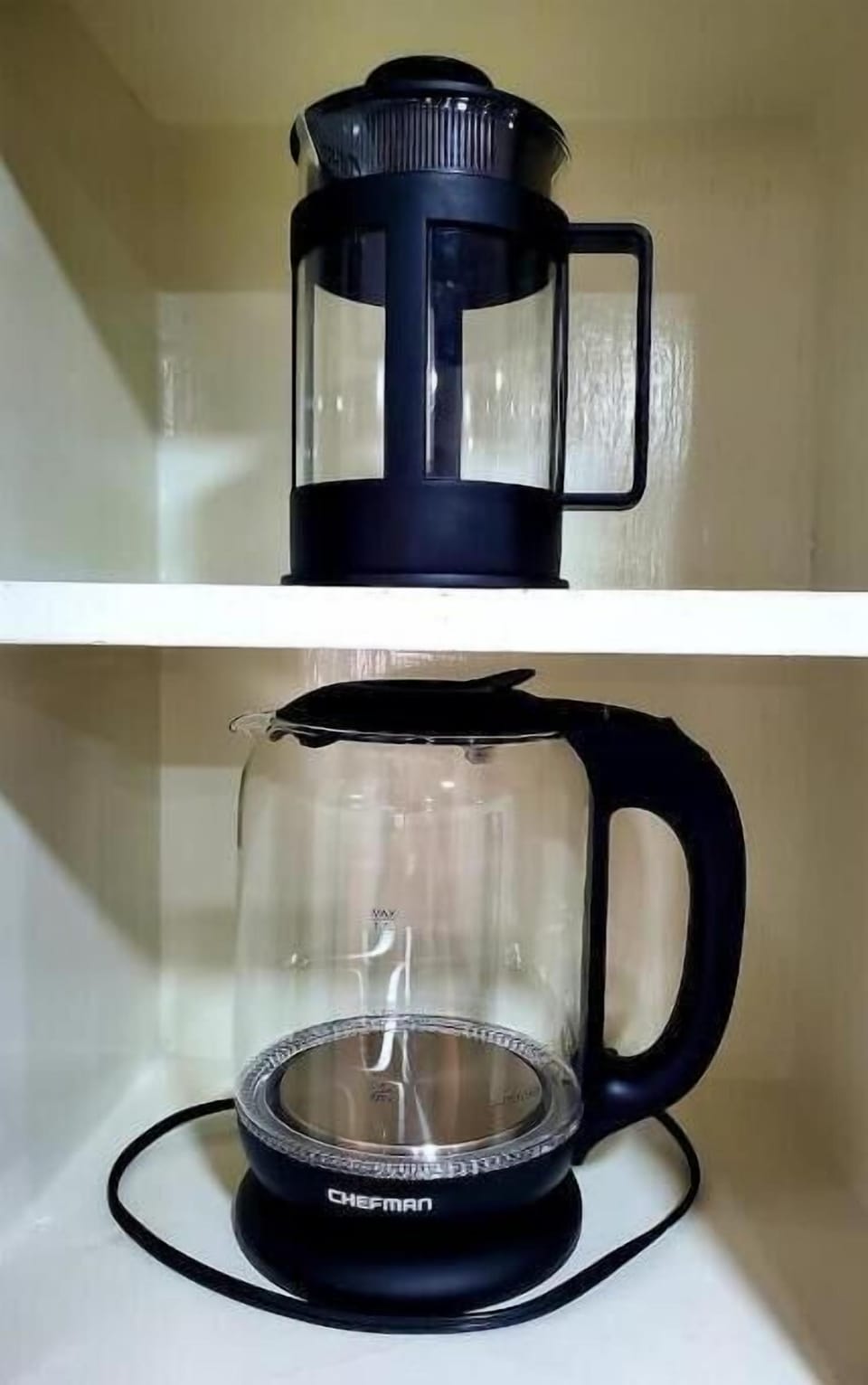 Kitchen: French press and a kettle.
