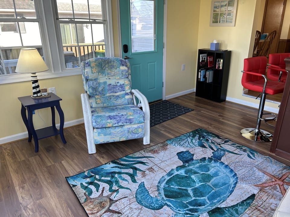 New sunroom leads to incredible new (June 2024) deck, outdoor shower. 