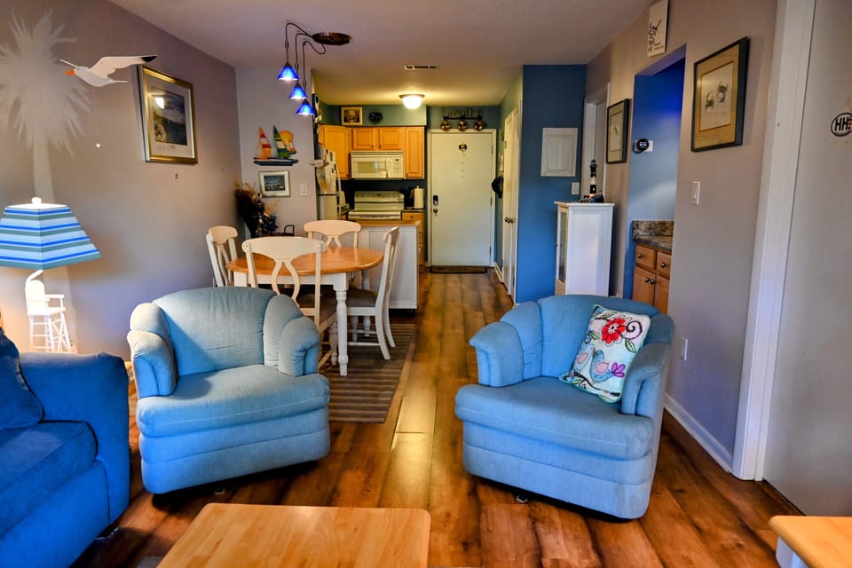 Living room, dining room, kitchen.