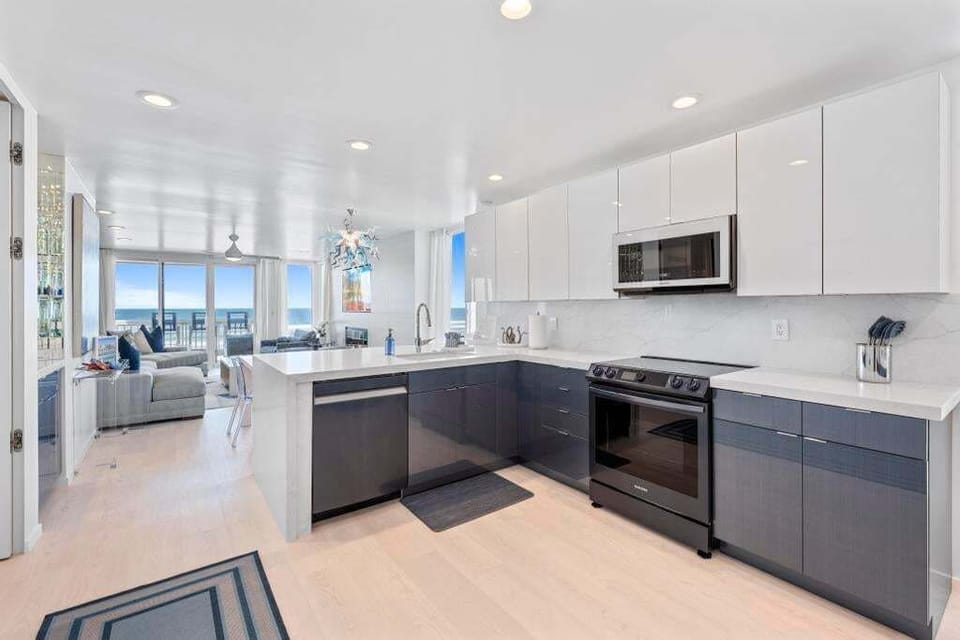 Modern and inviting, the kitchen's open layout and luxurious amenities inspire both casual breakfasts and elaborate dinners