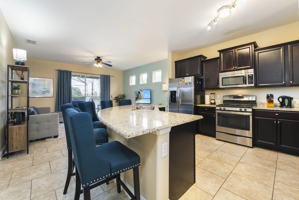 Kitchen with breakfast bar that seats 5