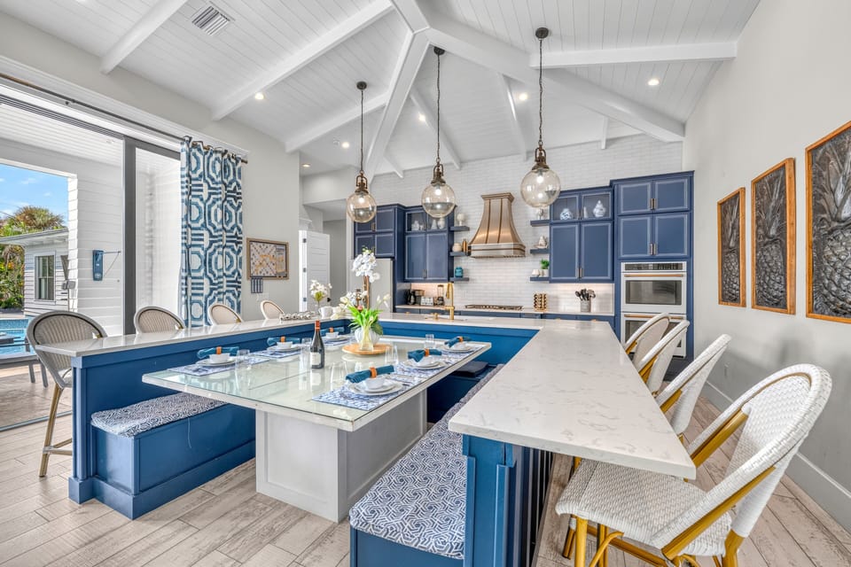 From morning coffee to evening dinners, the open kitchen and inviting banquette make every meal feel like part of the vacation.