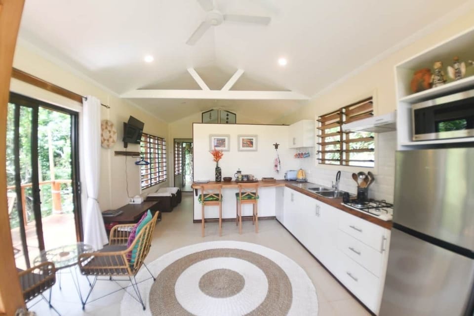 Self-catering made simple with a full kitchen—fridge/freezer, gas stove, microwave & all essentials
