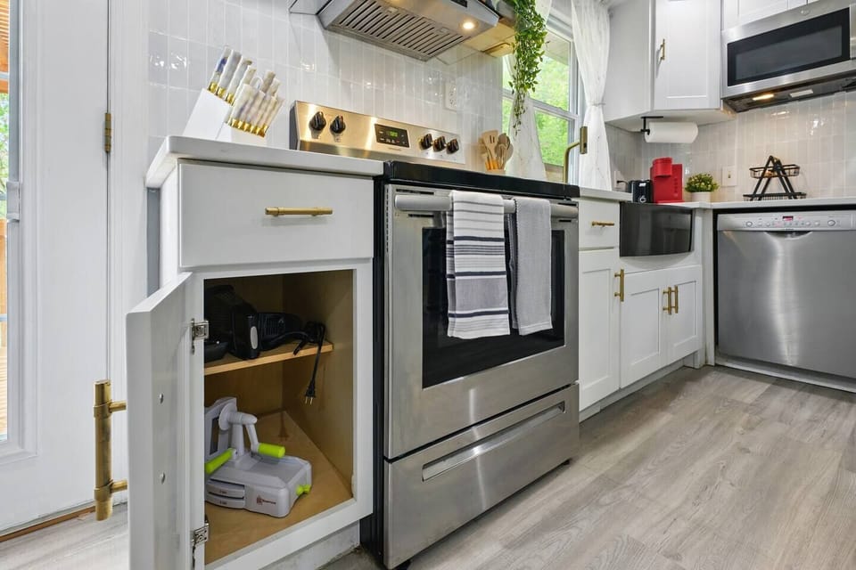 A tidy, bright kitchen space ready for quick meals or light cooking.