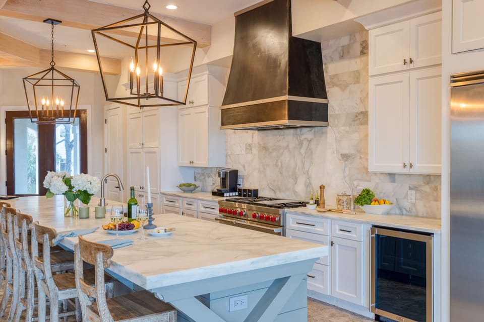 Stunning kitchen is fully equipped and features top-of-the-line appliances.