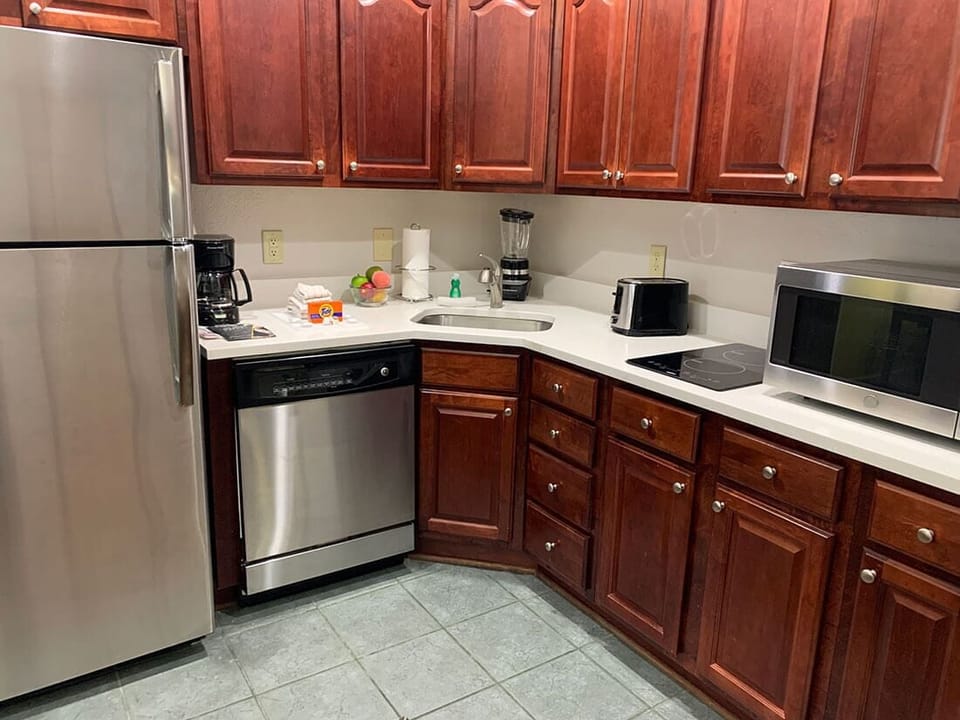 Partial kitchen with a 2 burner stove top and without an oven available in some condos, while others have a full kitchen. Requests can be made, but are not guaranteed.