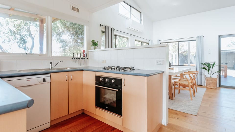 Central Kitchen - Pantry, Microwave, Gas Stove, Dishwasher, Family Size Fridge.