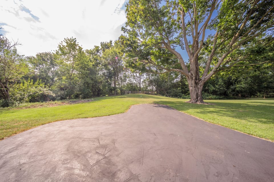 Paved driveway and parking spot.  