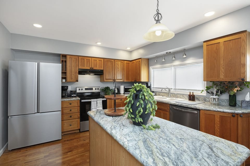 Modern kitchen with top appliances and spacious counters.