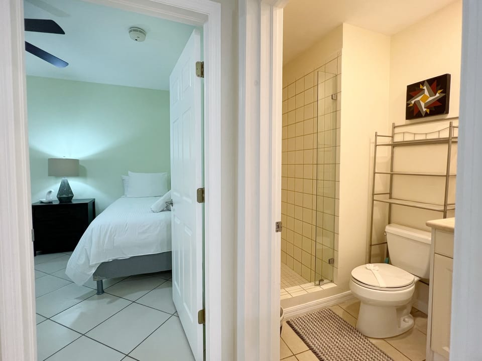 The second bedroom has a full bathroom set just outside the door.  