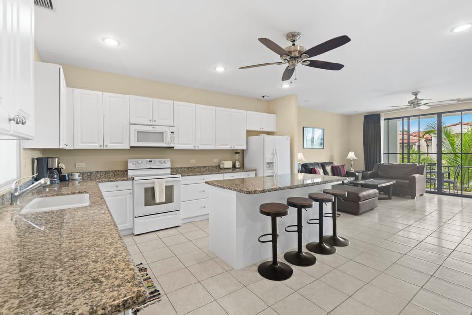 The condo has a large, open concept living and kitchen space.  Dine in at the breakfast bar or have meals al fresco on the covered terrace.  