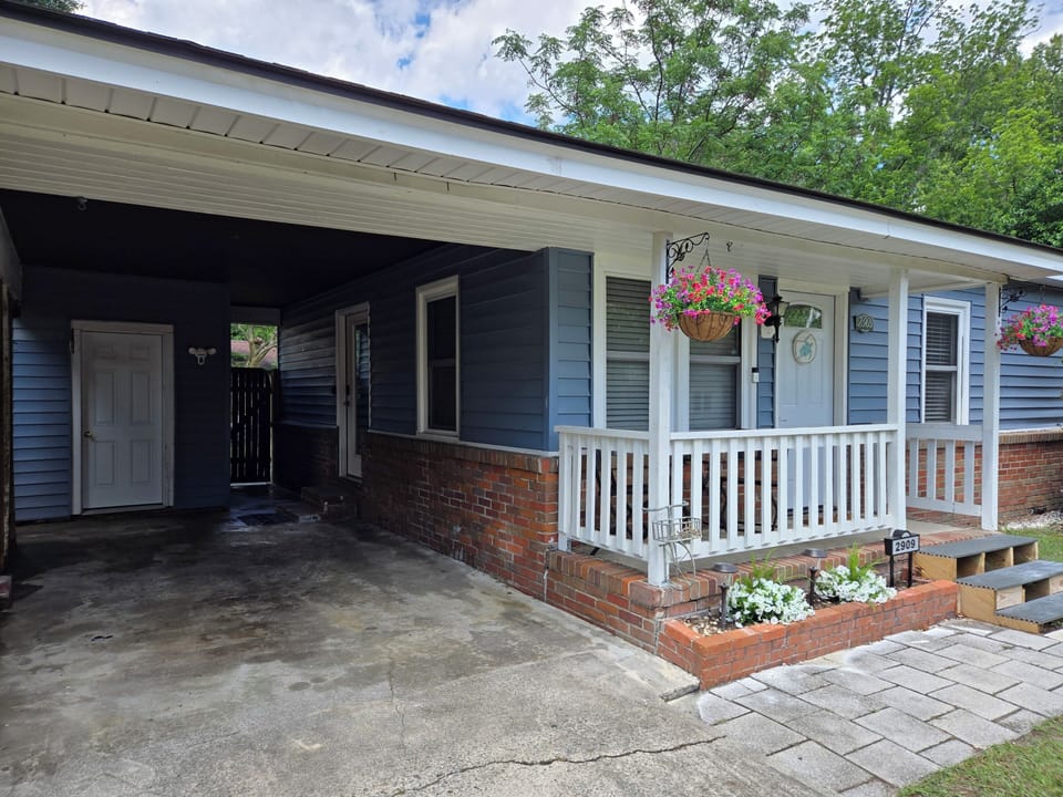 Door to the left is the detached Laundry Room/Utility Room.
