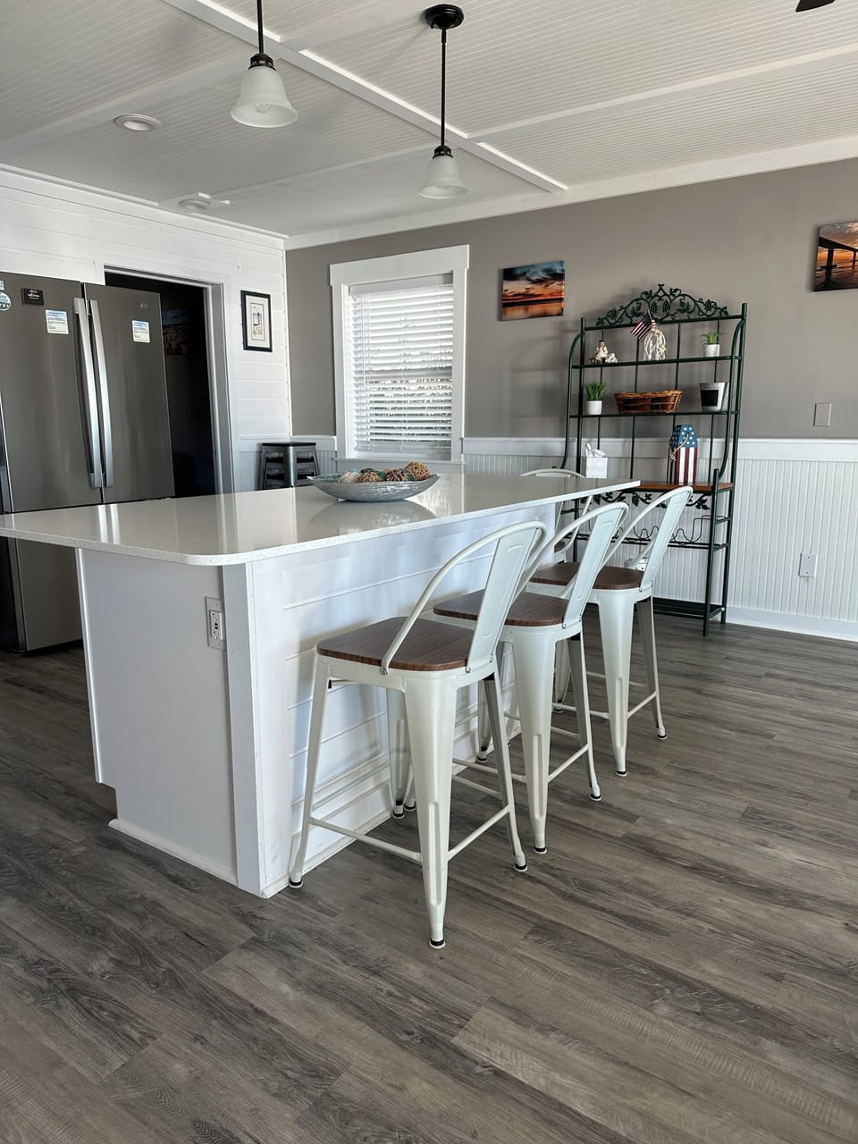 Brand new barstool chairs surrounding the kitchen island