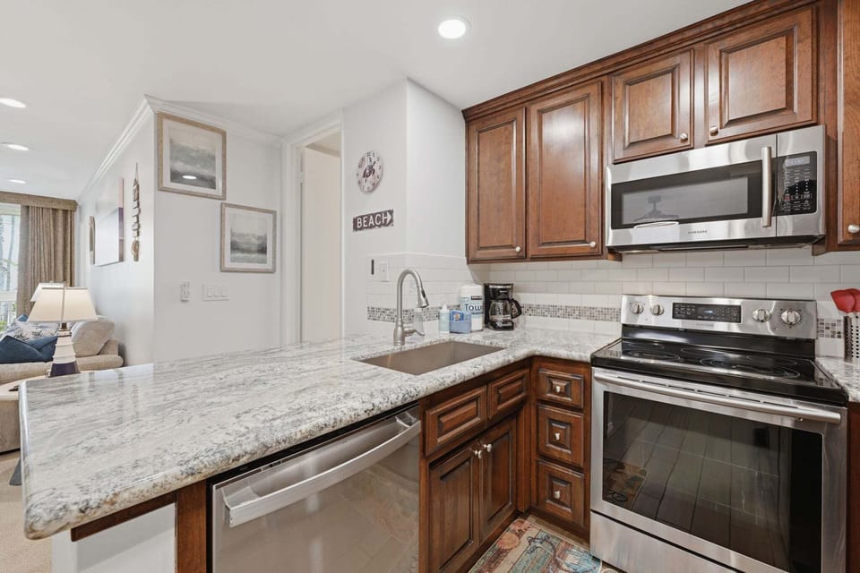 The kitchen includes a full selection of cookware, utensils, and essentials—perfect for preparing and enjoying meals throughout your vacation
