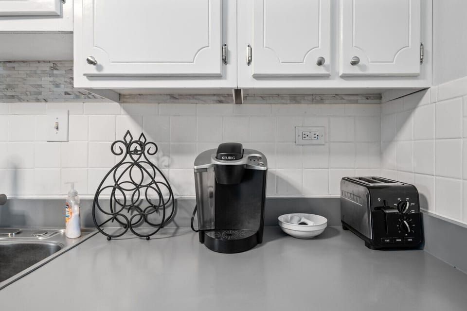 Cook up a storm in our well-equipped kitchen on the main floor, boasting a microwave, stove, oven, Keurig coffee maker, fridge freezer, dishwasher, and more.