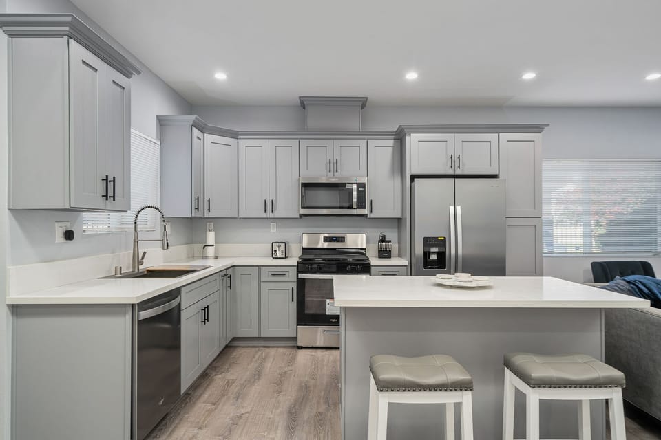 Kitchen island with 2 high chairs to match.