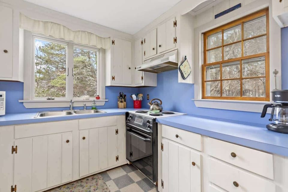 Well stocked kitchen with all the amenities a home cook needs 