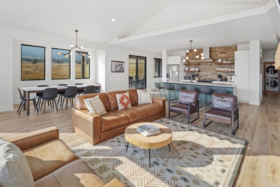 Open concept kitchen, living, dining is a perfect gathering spot for big groups