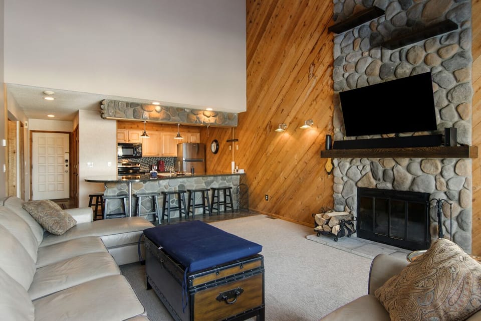 Spacious Living Room with Wood Fireplace.