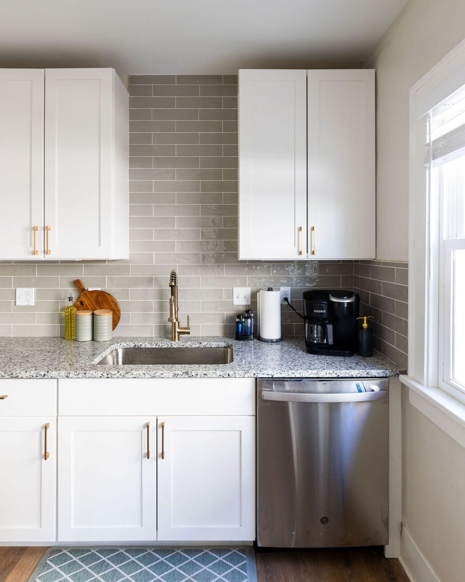 Ensure the cleanliness of your food in this kitchen, equipped with a sink for your convenience