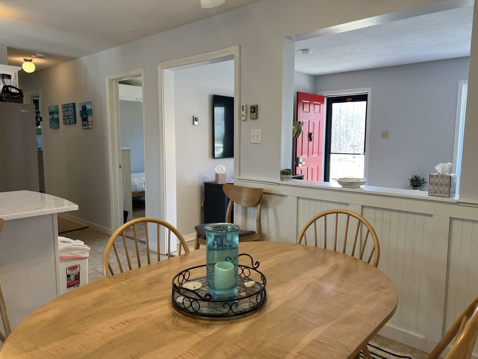 View from dining room table toward front door