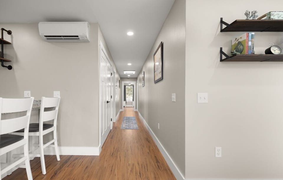 hallway with antique maps of mount desert island