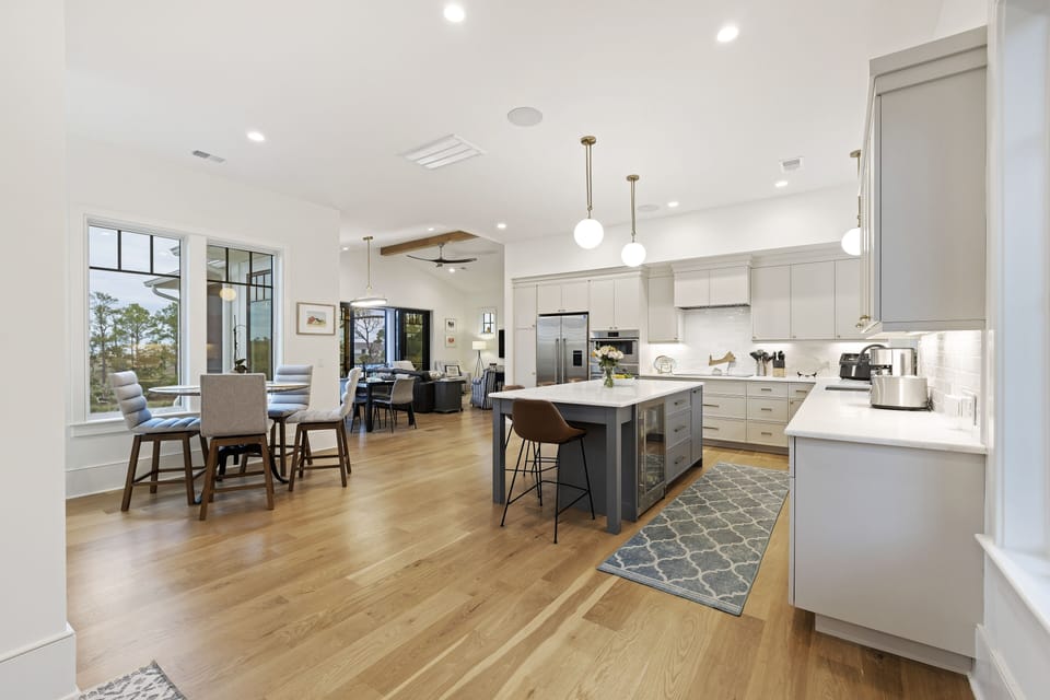 Moving to the 2nd floor, the main kitchen, living, and dining. - Reverse floorplan