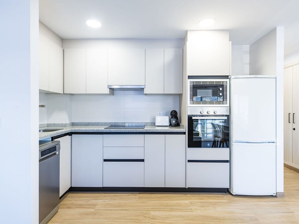 Cabinetry, Countertop, Kitchen Appliance, Kitchen Stove, Home Appliance, Sink, Kitchen, Building, Wood, Flooring
