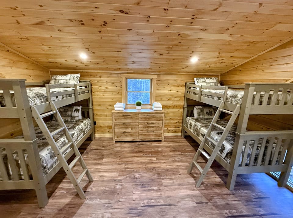 Two Twin-over-Twin bunks in loft