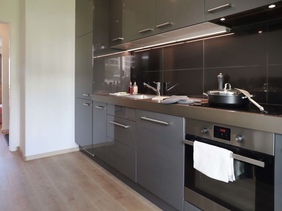 Cabinetry, Countertop, Tap, Kitchen Stove, Building, Wood, Kitchen, Kitchen Appliance, Interior Design, Stove