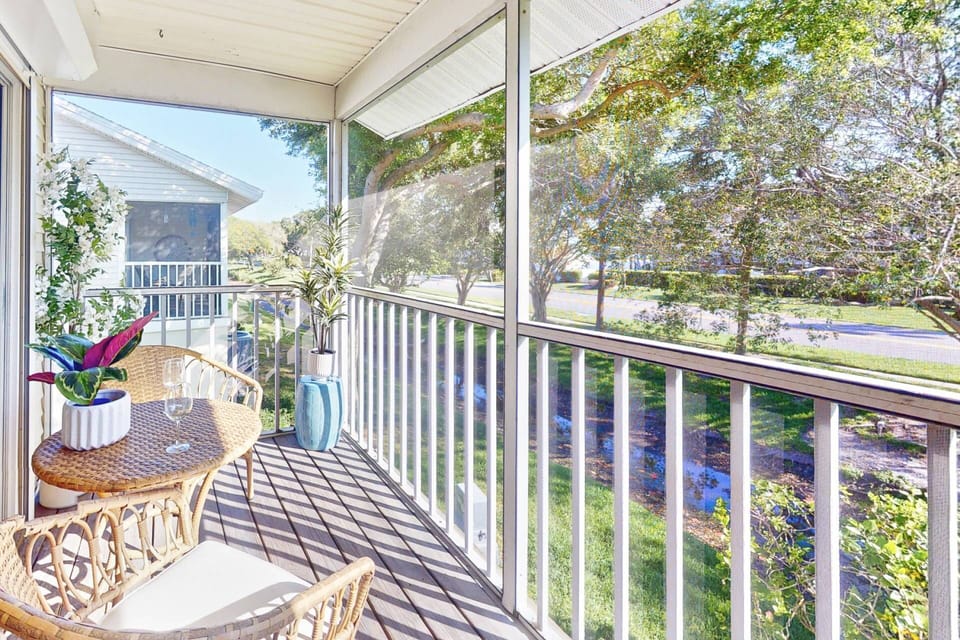 Screened in balcony overlooking the Sun Ketch neighborhood.