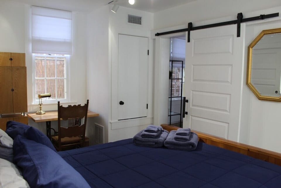Your first floor bedroom 'suite' is cosy and fashionable appointed.