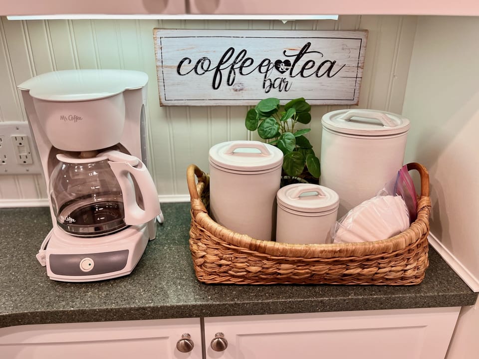 Coffee and tea station stocked for your enjoyment! 