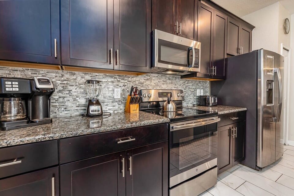 A fully-equipped kitchen with quality appliances
