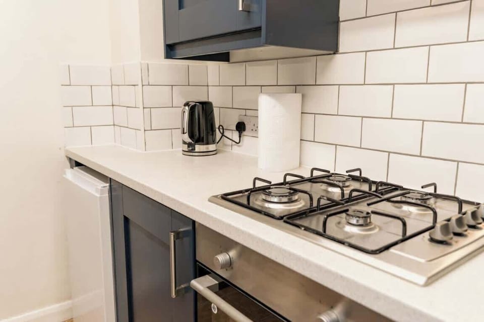 Kitchen:  with ample cupboard space and a gas stove and electric oven, you can make yourself right at home.