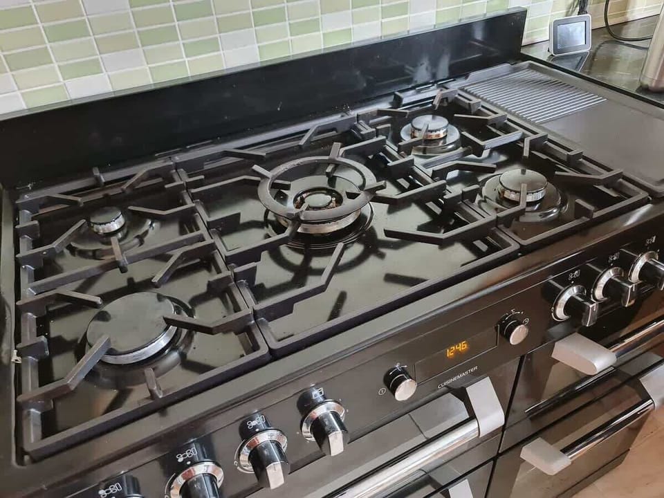 The Kitchen: with a new 5-ring stove, hosting dinner parties and preparing meals for large groups is a breeze.