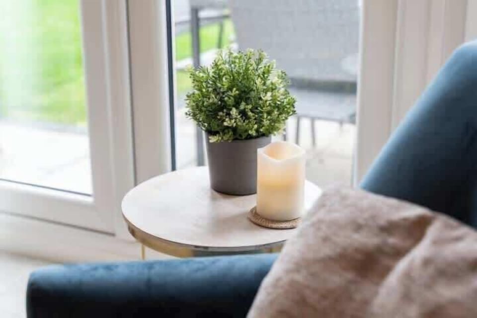 The Living Room: with patio doors leading out onto the garden, you can enjoy an evening with family and friends.