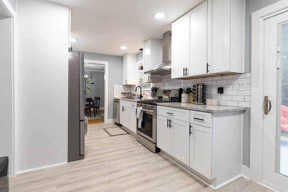 Fully Equipped Kitchen w/ modern stainless steel appliances from brands like Whirlpool, Samsung & LG!
