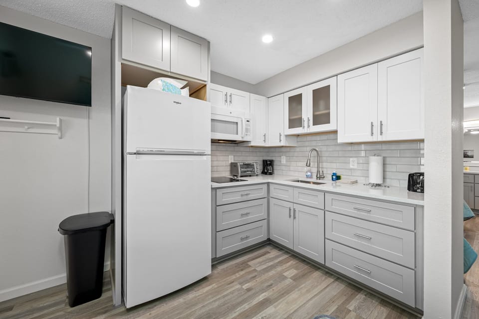 New Kitchen with cooktop, toaster oven & microwave