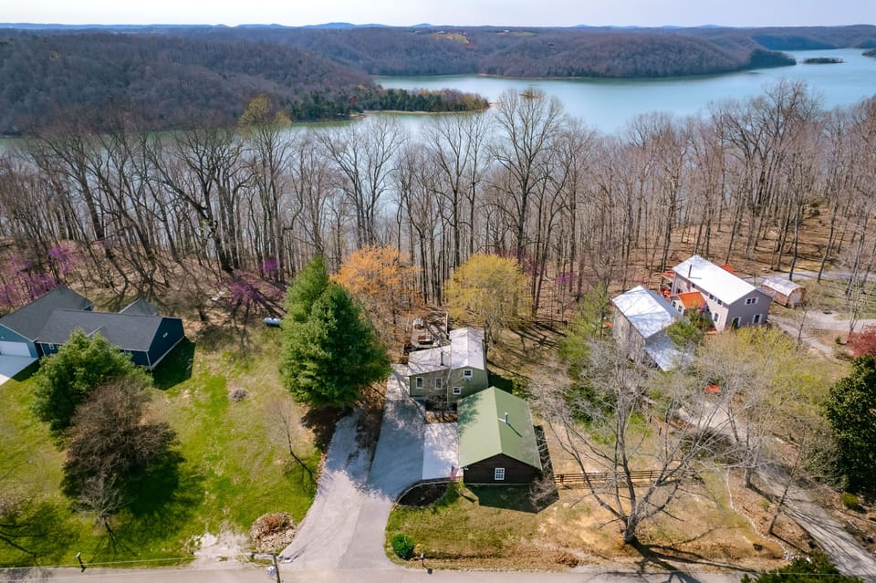 Aerial view of property showing 70ft boat parking + driveway.